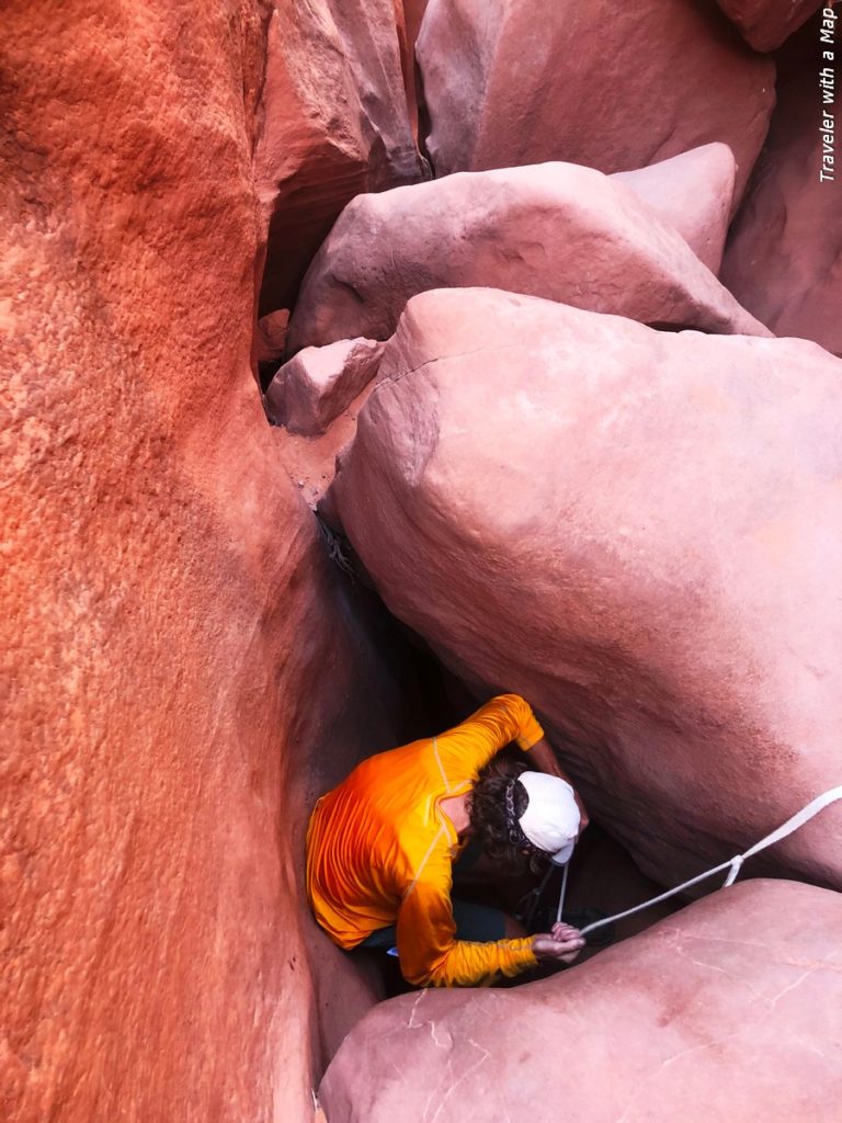 Using a rope at Spooky Gulch Canyon, Escalante